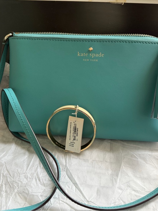 kate spade Other - 🍁🍁🍁kate spade turquoise crossbody with tassel Plus free bracelet Kate spade ♠️
